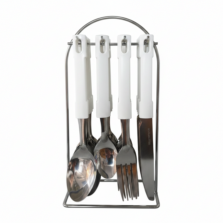 Set of white-handled cutlery including a spoon, fork, and knife in a metal stand